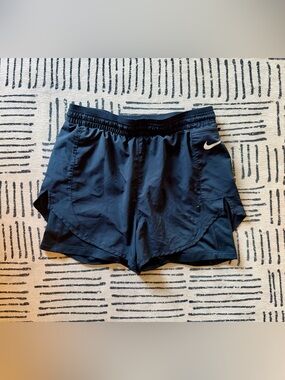 Nike Women's black Athletic Shorts with silver Swoosh
